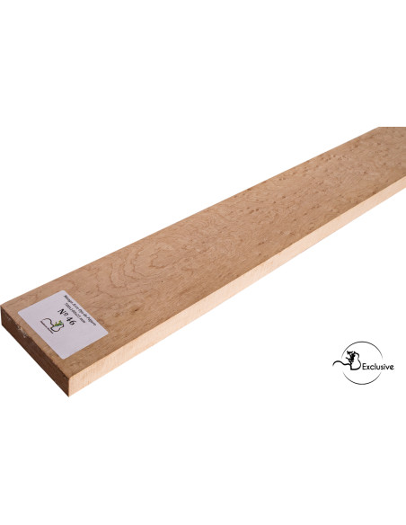 Detalle de la figura natural del arce ojo de pájaro en mango MB Exclusive para guitarra eléctrica