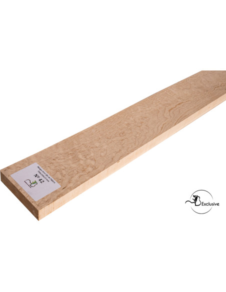 Detalle de la figura natural del arce ojo de pájaro en mango MB Exclusive para guitarra eléctrica