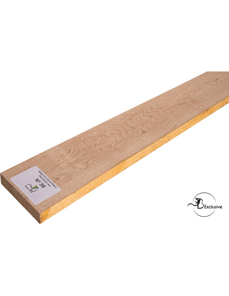 Detalle de la figura natural del arce ojo de pájaro en mango MB Exclusive para guitarra eléctrica