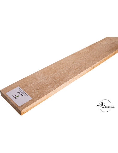 Detalle de la figura natural del arce ojo de pájaro en mango MB Exclusive para guitarra eléctrica
